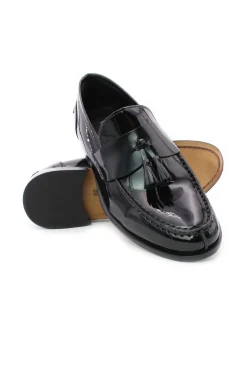 Mocassini in vernice con nappine