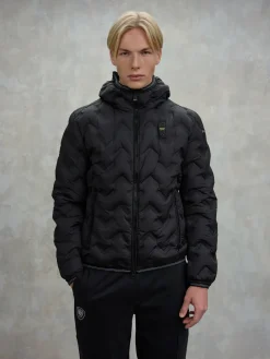 Piumino con impunture asimmetriche PIERY