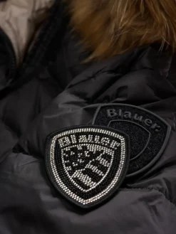 Piumino lungo con bordo in pelliccia KRISTIN